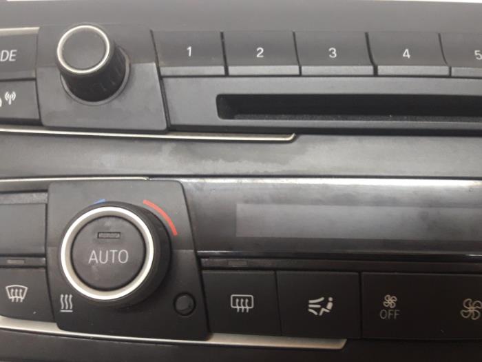 Panel de control de calefacción de un BMW 3-Serie 2013