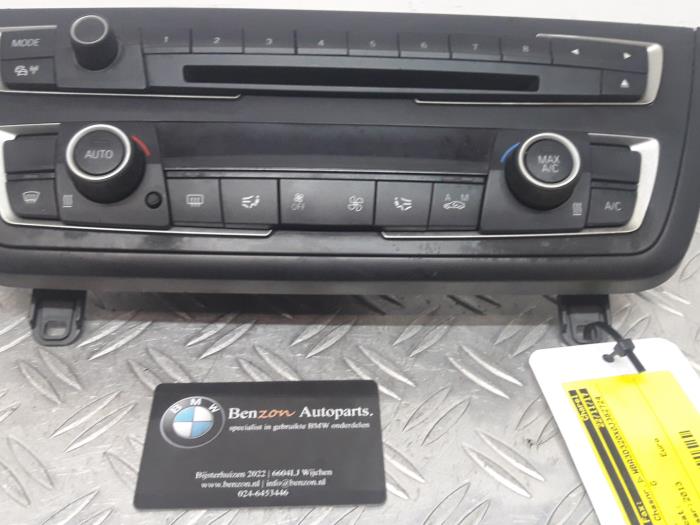 Panel de control de calefacción de un BMW 3-Serie 2013