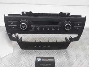 Usados Panel de control de calefacción BMW X6 Precio de solicitud ofrecido por Benzon Autodemontage
