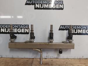 Used Fuel injector nozzle Opel Astra G (F08/48) 1.4 16V Twinport Price on request offered by Autodemontage Nijmegen