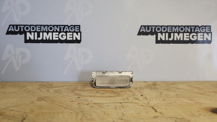 Registration plate light from a Citroën Berlingo 1.6 Hdi 16V 115 2014