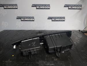 Used Storage compartment Daihatsu Cuore (L251/271/276) 1.0 12V DVVT Price on request offered by Autodemontage Nijmegen