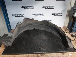 Used Wheel arch liner Daihatsu Cuore (L251/271/276) 1.0 12V DVVT Price on request offered by Autodemontage Nijmegen