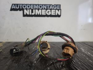 Used PCB, left taillight Daihatsu Cuore (L251/271/276) 1.0 12V DVVT Price on request offered by Autodemontage Nijmegen