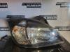 Headlight, right from a Kia Rio II (DE), 2005 / 2011 1.4 16V, Hatchback, Petrol, 1.399cc, 71kW (97pk), FWD, G4EE, 2005-03 / 2011-12 2010