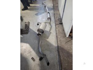 Used Exhaust (complete) Daihatsu Cuore (L251/271/276) 1.0 12V DVVT Price on request offered by Autodemontage Nijmegen