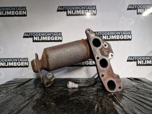 Used Catalytic converter Daihatsu Cuore (L251/271/276) 1.0 12V DVVT Price on request offered by Autodemontage Nijmegen