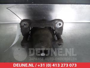 Używane Zacisk hamulcowy lewy przód Nissan Pixo (D31S) 1.0 12V Cena € 35,00 Procedura marży oferowane przez V.Deijne Jap.Auto-onderdelen BV