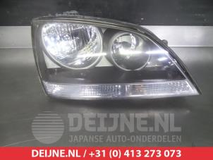 Used Headlight, right Kia Sorento I (JC) 2.5 CRDi 16V Price € 50,00 Margin scheme offered by V.Deijne Jap.Auto-onderdelen BV