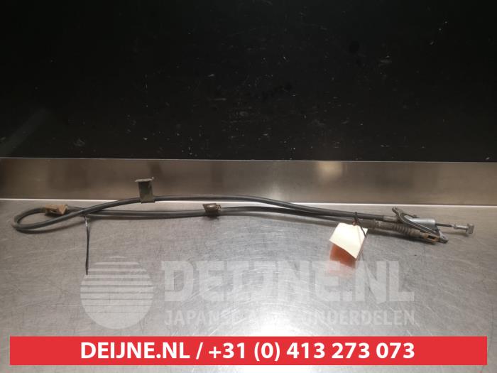 Usagé Câble frein à main Nissan Almera (N16) 1.5 16V Prix € 20,00 Règlement à la marge proposé par V.Deijne Jap.Auto-onderdelen BV