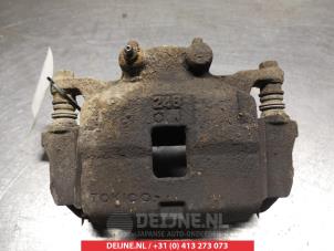 Used Front brake calliper, left Mitsubishi L-200 2.5 DI-D 4x4 Price € 45,00 Margin scheme offered by V.Deijne Jap.Auto-onderdelen BV