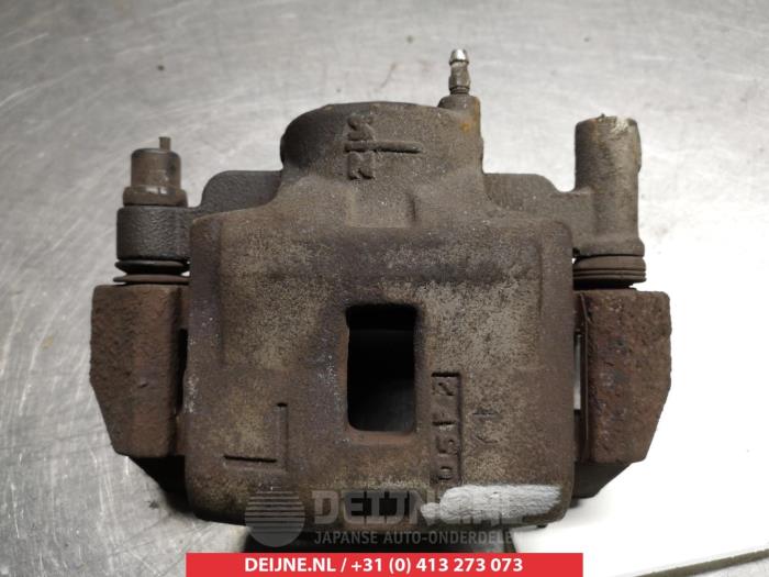 Gebrauchte Bremszange links vorne Mazda 323 Fastbreak (BJ14) 1.6 16V Preis € 25,00 Margenregelung angeboten von V.Deijne Jap.Auto-onderdelen BV