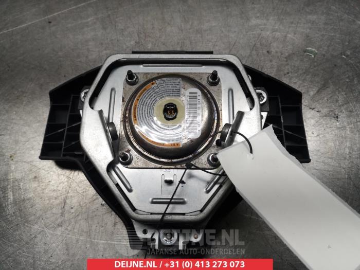 Left airbag (steering wheel) from a Nissan Pixo (D31S) 1.0 12V 2012