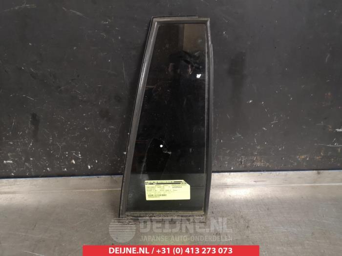Usados Ventanilla triangular derecha detrás Mitsubishi Pajero Sport (K7/9) 2.5 TD GLS Precio € 35,00 Norma de margen ofrecido por V.Deijne Jap.Auto-onderdelen BV