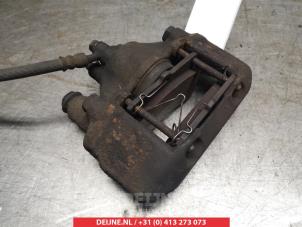 Used Front brake calliper, right Mazda Demio (DW) 1.5 16V Price € 25,00 Margin scheme offered by V.Deijne Jap.Auto-onderdelen BV