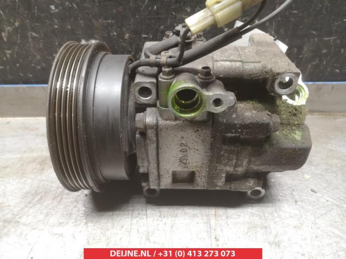 Usagé Compresseur de clim Mazda Premacy 1.8 16V Prix € 25,00 Règlement à la marge proposé par V.Deijne Jap.Auto-onderdelen BV