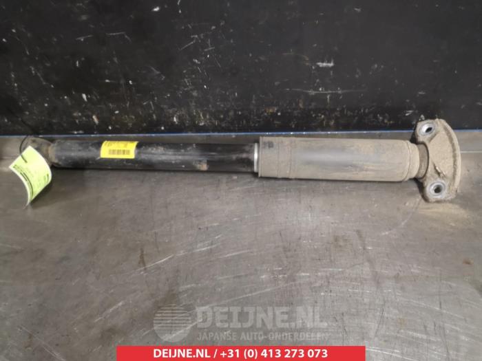 Rear shock absorber, left from a Daewoo Orlando (YYM/YYW) 2.0 D 16V 2011