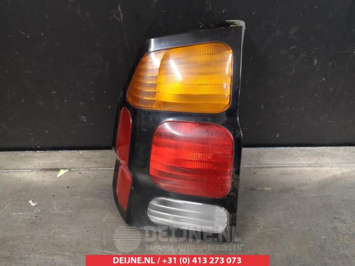 Taillight, left from a Mitsubishi Pajero Sport (K7/9) 2.5 TD GLS 2003
