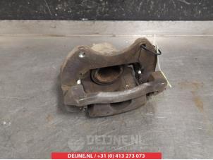 Used Front brake calliper, left Daihatsu Materia 1.3 16V Price € 40,00 Margin scheme offered by V.Deijne Jap.Auto-onderdelen BV