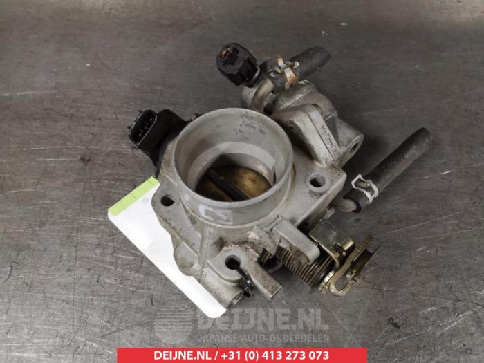 Usagé Boitier papillon Mazda 323 (BJ12) 1.6 16V Prix € 25,00 Règlement à la marge proposé par V.Deijne Jap.Auto-onderdelen BV