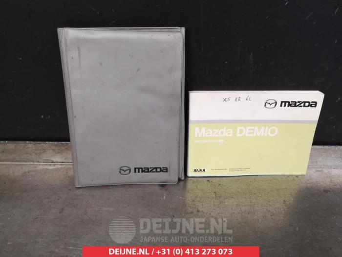 Betriebsanleitung van een Mazda Demio (DW) 1.3 16V 1999