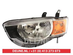 New Headlight, left Mitsubishi Colt Price € 165,08 Inclusive VAT offered by V.Deijne Jap.Auto-onderdelen BV