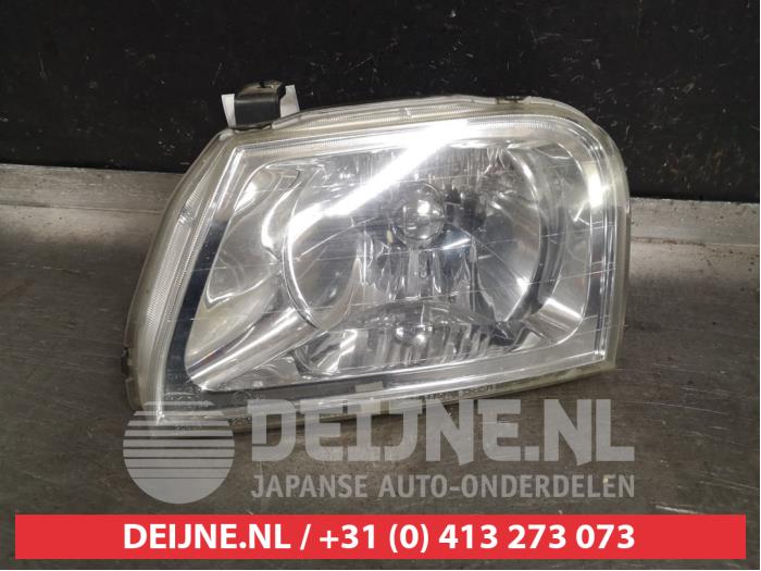 Używane Reflektor lewy Mitsubishi L-200 2.5 TDI 4x4 Cena € 50,00 Procedura marży oferowane przez V.Deijne Jap.Auto-onderdelen BV