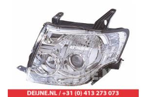 New Headlight, left Mitsubishi Pajero Price € 197,75 Inclusive VAT offered by V.Deijne Jap.Auto-onderdelen BV