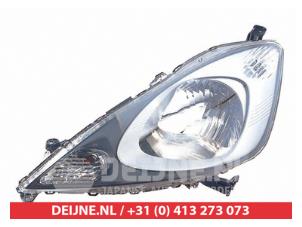 New Headlight, left Honda Jazz Price € 154,19 Inclusive VAT offered by V.Deijne Jap.Auto-onderdelen BV