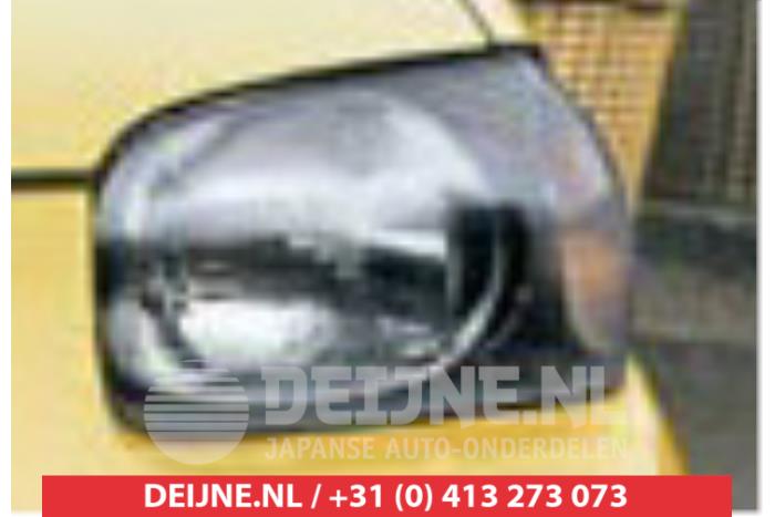 Headlight, left from a Suzuki Alto 2002