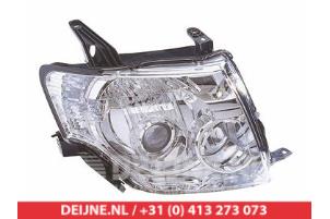 New Headlight, right Mitsubishi Pajero Price € 197,75 Inclusive VAT offered by V.Deijne Jap.Auto-onderdelen BV