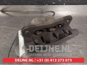Used Front brake calliper, right Kia Carnival 2 (FIB/FLD) 2.9 HPDi 16V Price € 35,00 Margin scheme offered by V.Deijne Jap.Auto-onderdelen BV