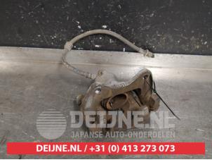 Used Front brake calliper, left Daihatsu Cuore (L251/271/276) 1.0 12V DVVT Price € 35,00 Margin scheme offered by V.Deijne Jap.Auto-onderdelen BV