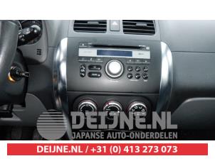 Używane Panel sterowania nagrzewnicy Suzuki SX4 (EY/GY) 1.6 16V VVT Comfort,Exclusive Autom. Cena € 50,00 Procedura marży oferowane przez V.Deijne Jap.Auto-onderdelen BV
