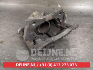 Used Front brake calliper, left Nissan Micra (K14) 1.0 12V Price € 50,00 Margin scheme offered by V.Deijne Jap.Auto-onderdelen BV
