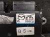 Ignition lock + key from a Mazda 3 Sport (BL14/BLA4/BLB4) 2.0i MZR DISI 16V 2009
