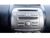 Radio from a Subaru Justy (M3), 2007 / 2011 1.0 12V DVVT, Hatchback, 4-dr, Petrol, 998cc, 51kW (69pk), FWD, 1KRFE, 2007-01 / 2011-03, M351 2009