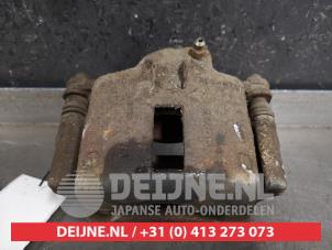Used Front brake calliper, left Nissan Micra (K11) 1.0 L,LX 16V Price € 25,00 Margin scheme offered by V.Deijne Jap.Auto-onderdelen BV