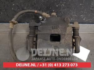 Used Front brake calliper, right Daihatsu Cuore (L251/271/276) 1.0 12V DVVT Price € 35,00 Margin scheme offered by V.Deijne Jap.Auto-onderdelen BV