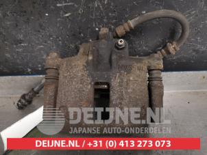 Used Front brake calliper, left Nissan Micra (K11) 1.0 16V Price € 25,00 Margin scheme offered by V.Deijne Jap.Auto-onderdelen BV