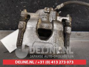 Used Front brake calliper, left Nissan Micra (K14) 1.0 IG-T 100 Price € 50,00 Margin scheme offered by V.Deijne Jap.Auto-onderdelen BV