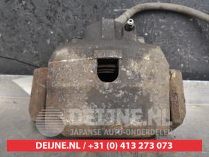 Used Front brake calliper, left Mazda Tribute 2.0 16V Price € 30,00 Margin scheme offered by V.Deijne Jap.Auto-onderdelen BV