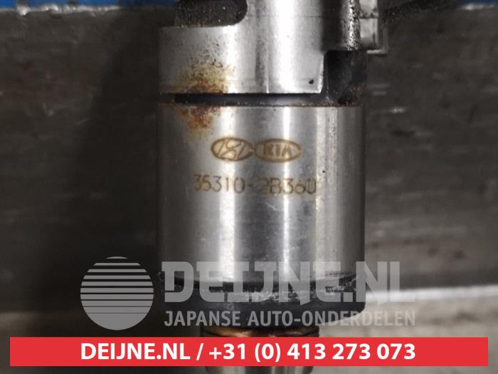 Injektor (Benzineinspritzung) van een Hyundai Tucson (TL) 1.6 GDi 16V 2WD 2019