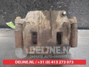 Used Front brake calliper, left Kia Sorento I (JC) 2.5 CRDi 16V Price € 35,00 Margin scheme offered by V.Deijne Jap.Auto-onderdelen BV