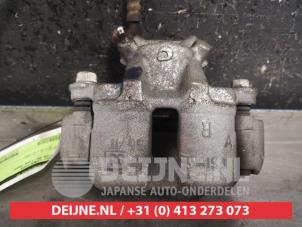 Used Front brake calliper, left Daihatsu Terios (J2) 1.5 16V DVVT 4x2 Euro 4 Price € 35,00 Margin scheme offered by V.Deijne Jap.Auto-onderdelen BV