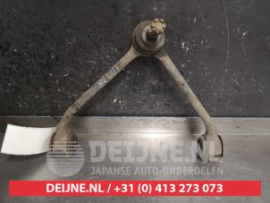 Used Front upper wishbone, left Ssang Yong Rexton W 2.0 e-200 Xdi 16V 2WD Price on request offered by V.Deijne Jap.Auto-onderdelen BV