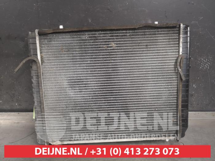 Radiator from a SsangYong Musso EX 3.2 24V Autom. 2001
