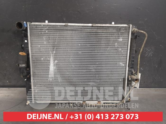 Used Radiator Ssang Yong Musso EX 3.2 24V Autom. Price € 50,00 Margin scheme offered by V.Deijne Jap.Auto-onderdelen BV