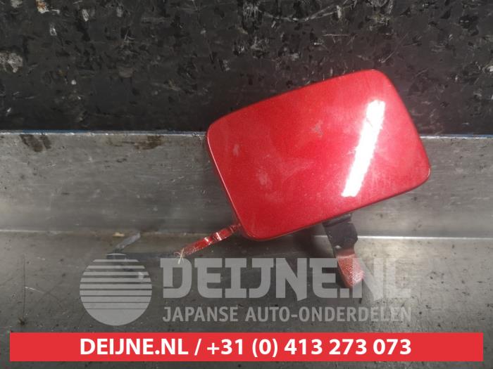 Towing eye cover, front from a Honda Jazz (GR) 1.5 eHEV 16V 2020