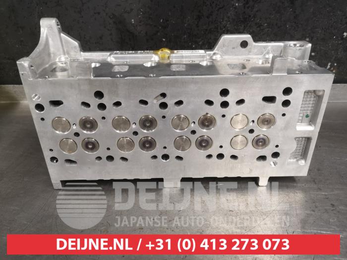 Cylinder head Suzuki Swift 1.3 DDis 16V - 1110085E00 Z13DT